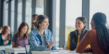 University students talking and studying. 