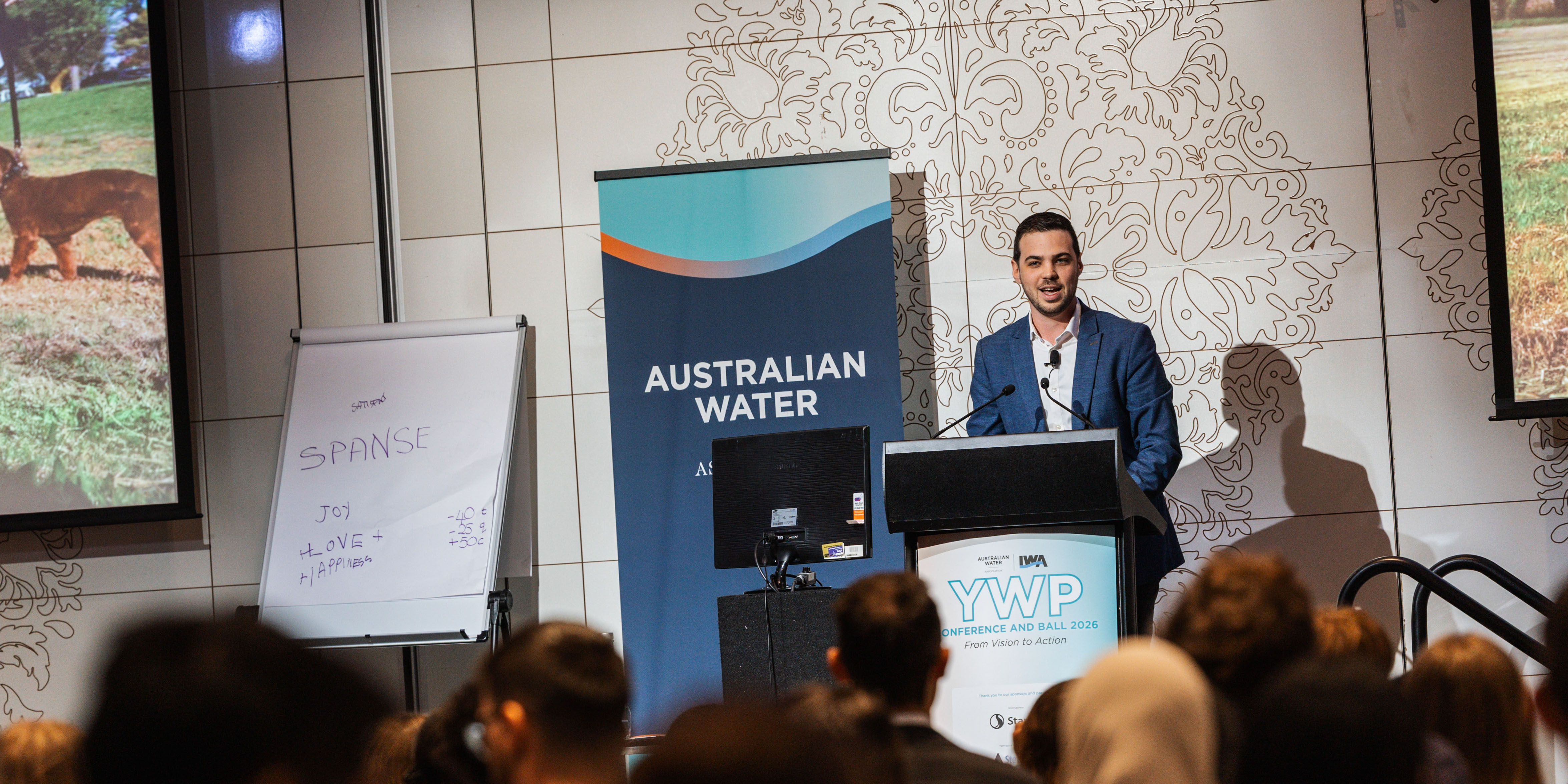 Declan Clausen presenting a keynote address at the IWA/AWA YWP Conference.