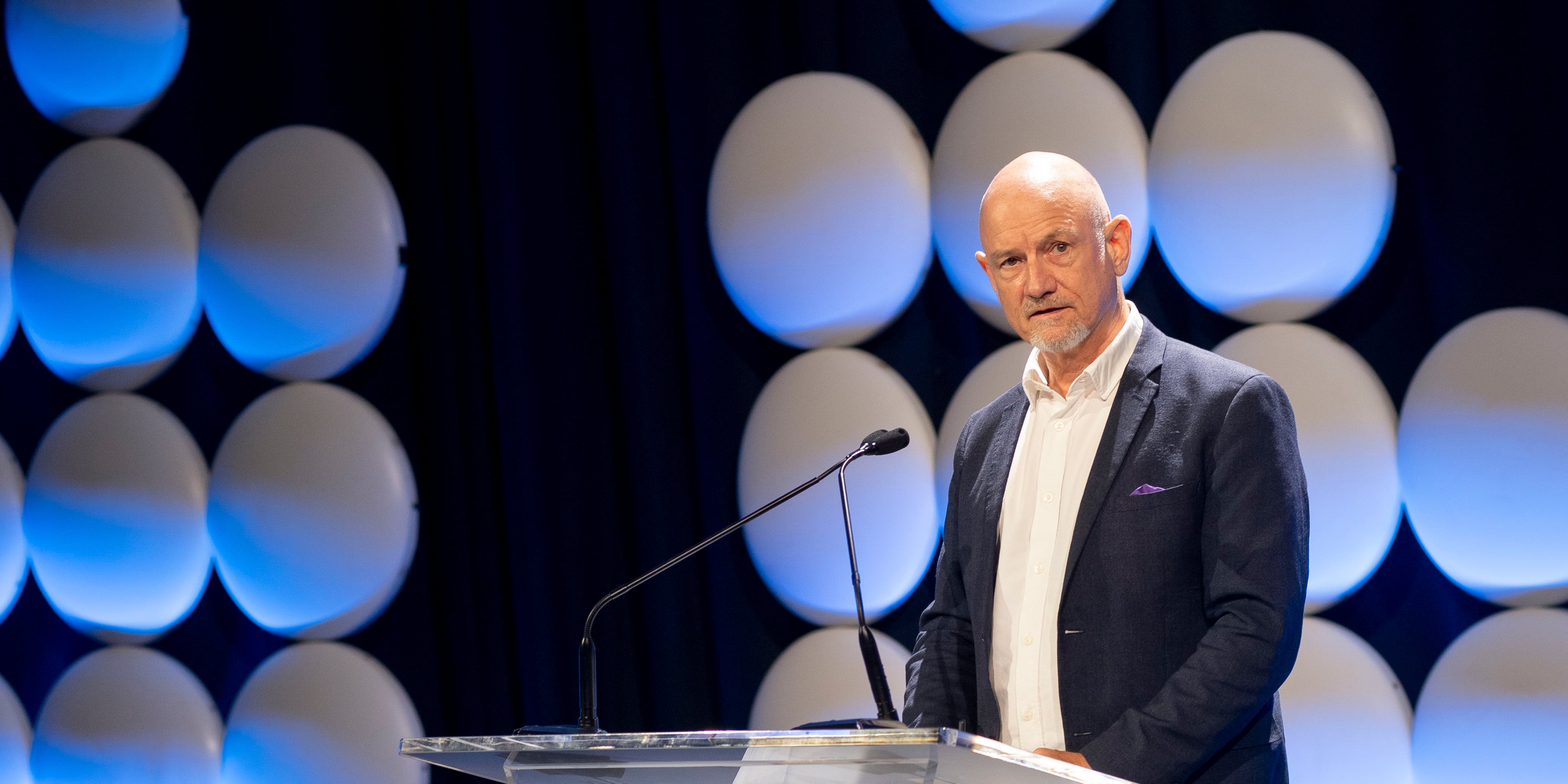 Paul Chatterton presenting a keynote address at Ozwater'26.