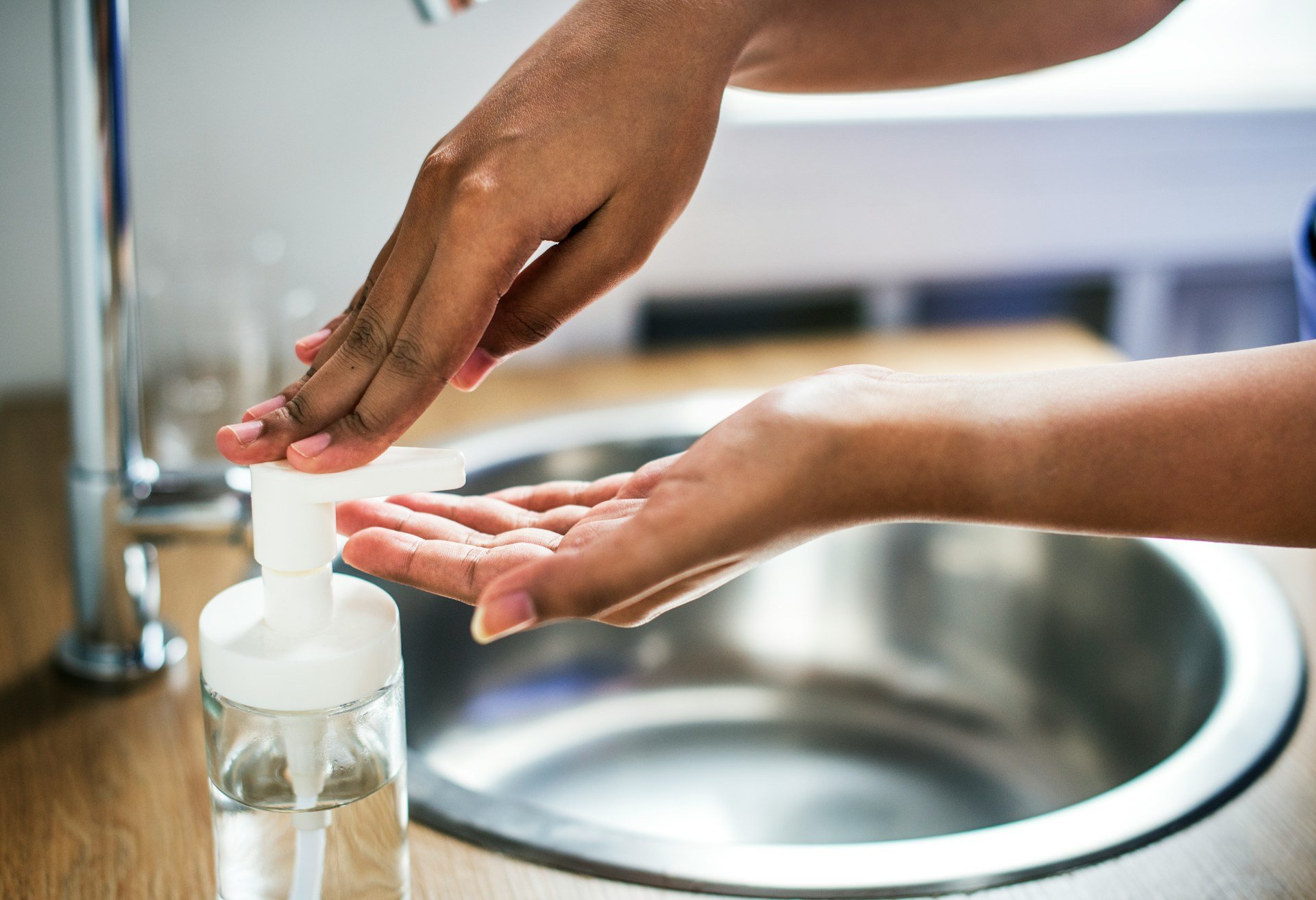 Person washing hands in a hospital